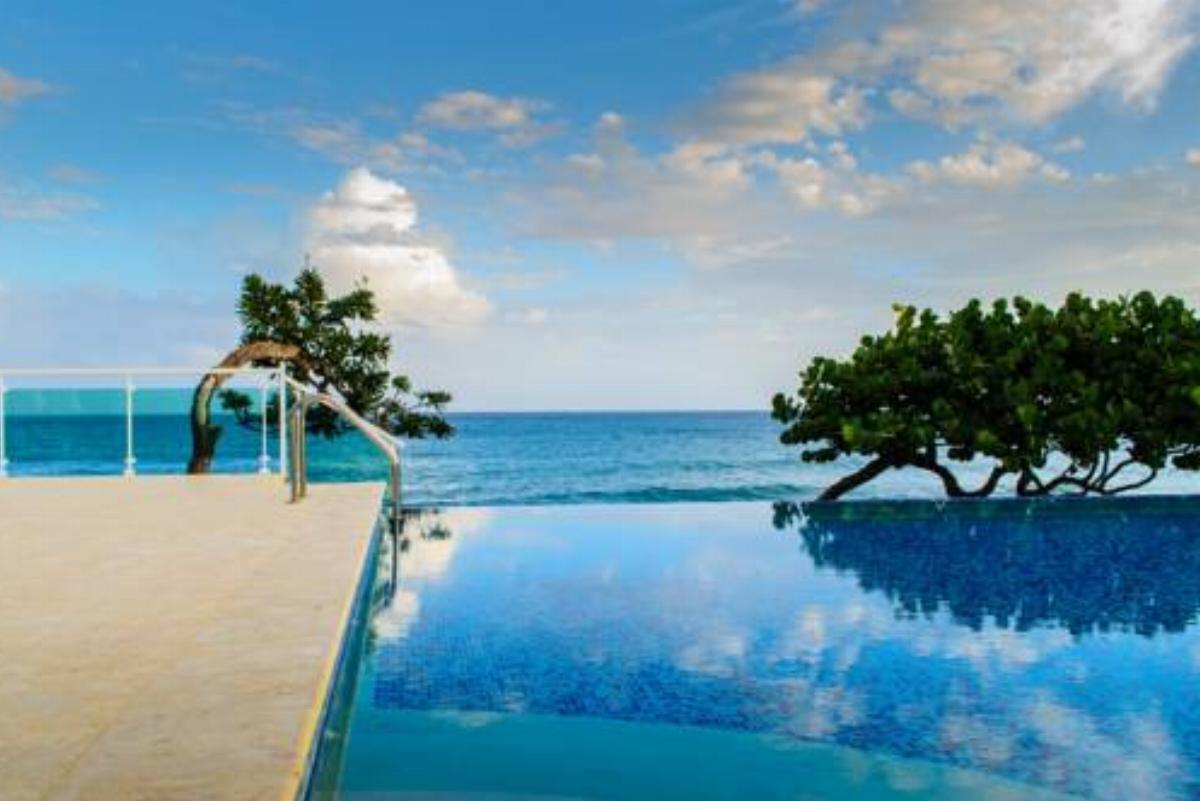 Escondido Bay Laguna Beach Front Condos & Villas Hotel Sosúa Dominican Republic