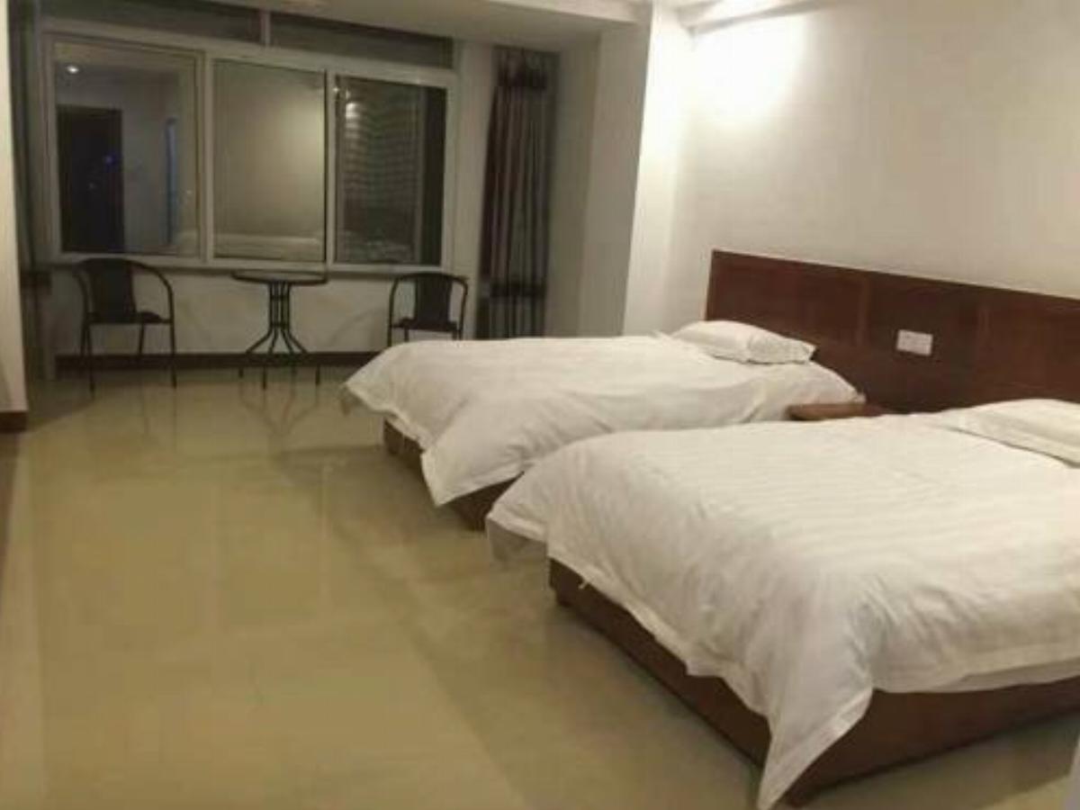 Guan Hai Apartment Hotel Lingshui China