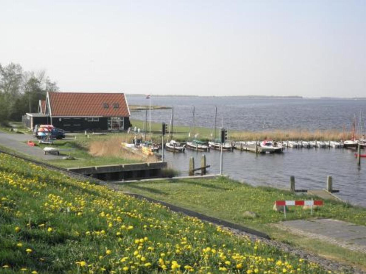 House on the harbor with parking and private jetty Hotel Anjum Netherlands