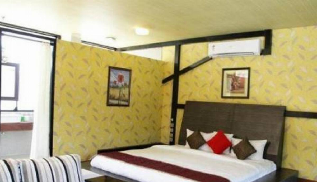 Romantic stay in corbett Hotel Garjia India